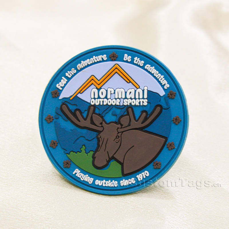 Soft touch 3D embossed custom PVC rubber labels for clothing and bags