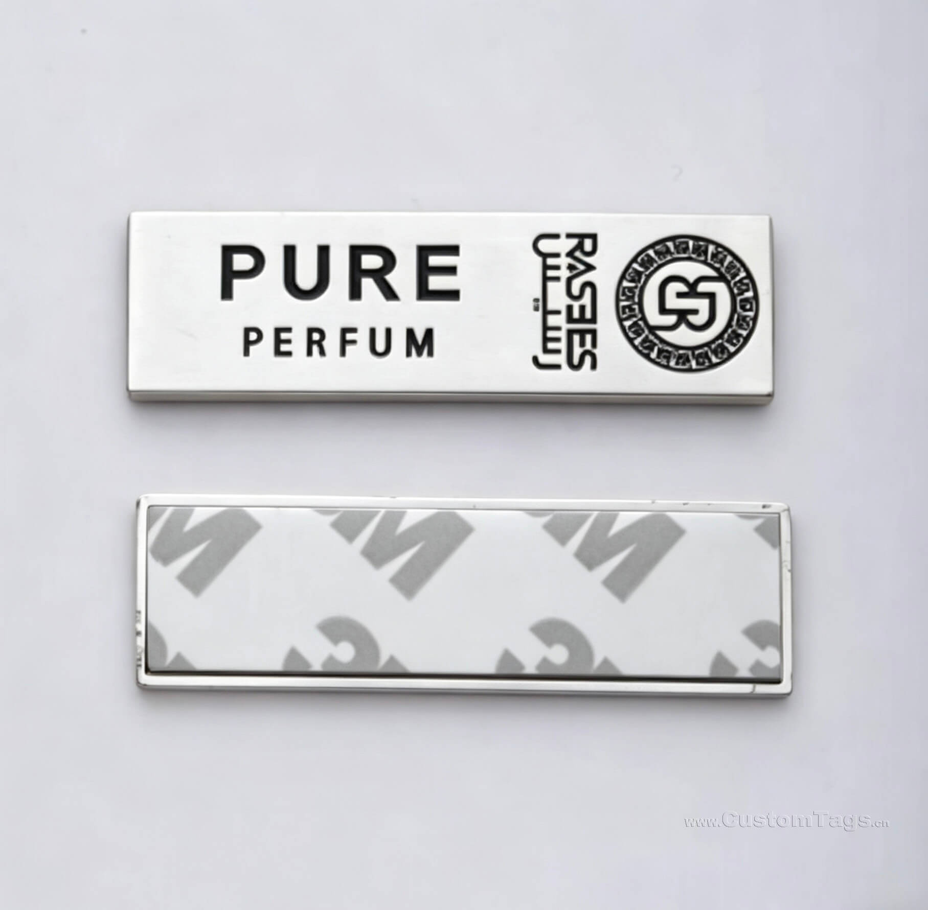 Custom peel-and-stick metal brand tags with 3M adhesive