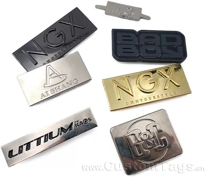 Premium embossed clothing label with a tactile 3D raised logo effect