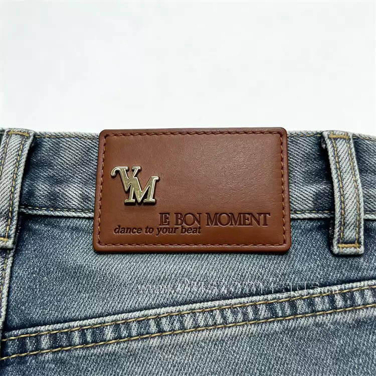 Application scenarios of custom faux leather labels and tags: sewing