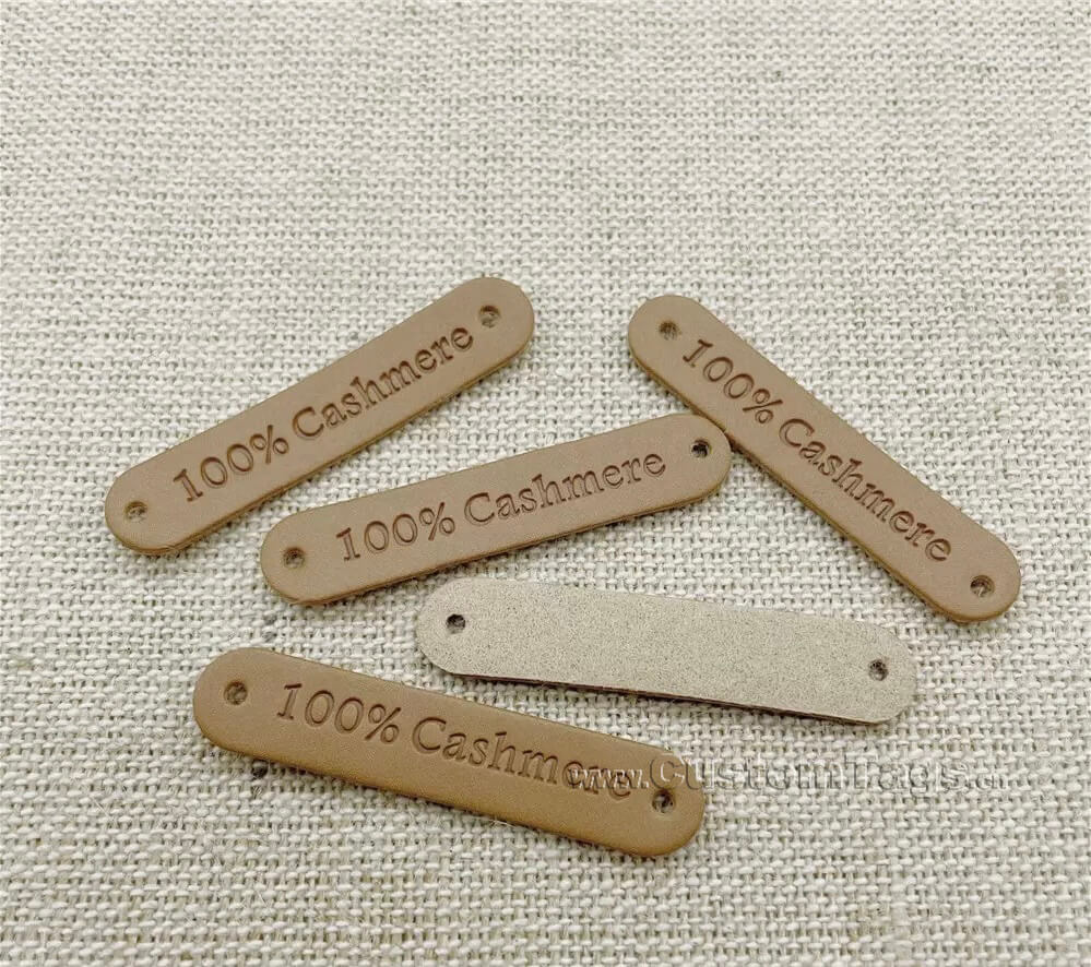 Custom leather labels & Tags backing fixing method ：sewing hole
