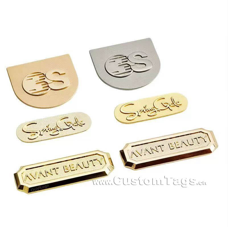 custom embossed metal labels and tags for clothing with logo